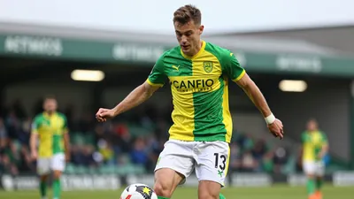 A photorealistic image of an anonymous 25-year-old Norwich City winger in a green and yellow jersey, with a white and...